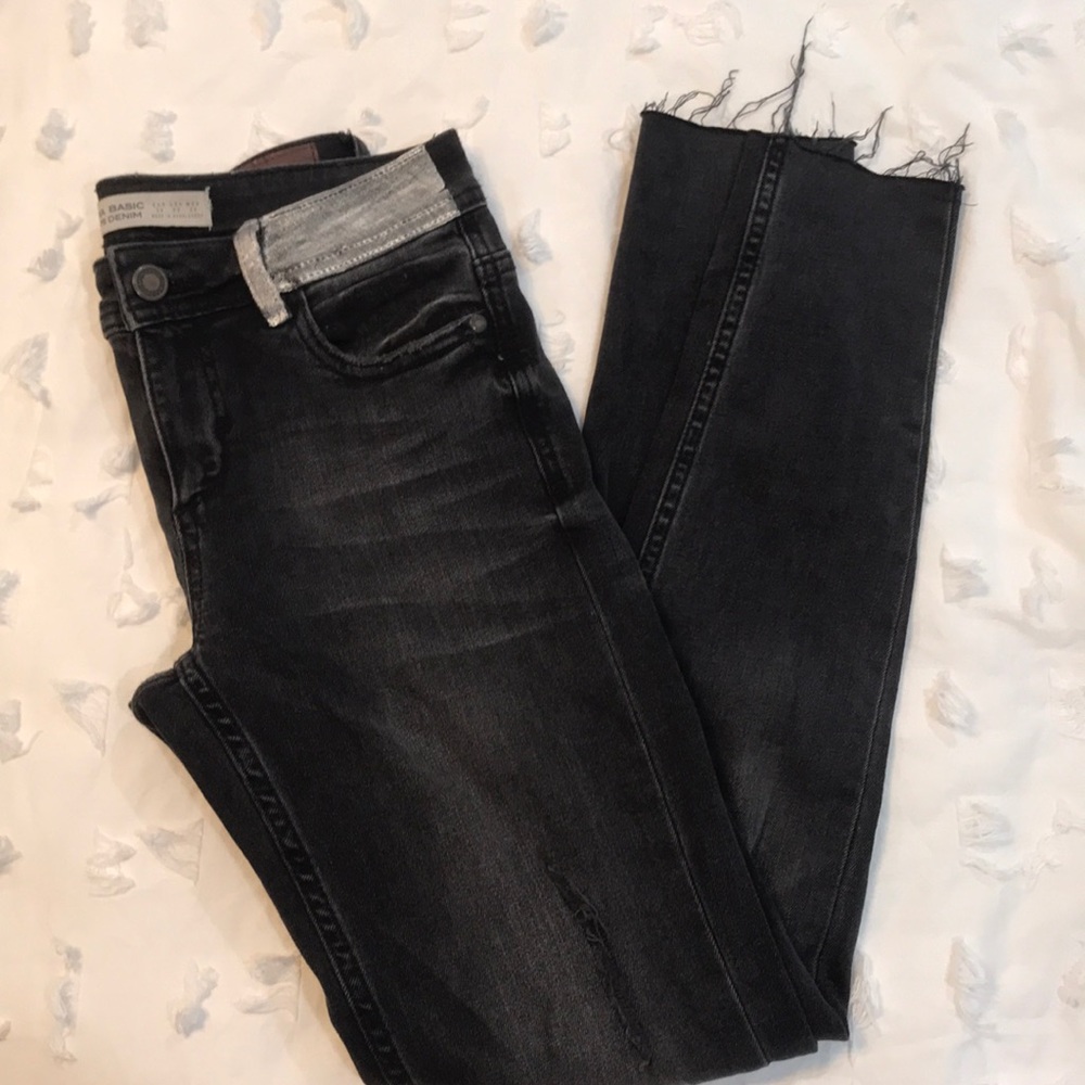 Distressed denim pants